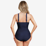 Shaping swimsuit with pink pleats and adjustable straps